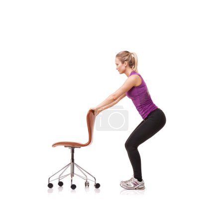 Photo for Office, chair and woman in squat, exercise or crouch in white background or studio. Person, stretching and workout with a seat for fitness, health and wellness or pilates practice for posture. - Royalty Free Image