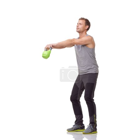 Photo for Training, workout and studio man with kettlebell for muscle growth, strength development or weightlifting performance. Gym equipment, weight lifting technique and sports athlete on white background. - Royalty Free Image