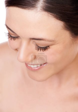 Photo for Beauty, eyelash and woman in studio for makeup, cosmetics or wellness closeup. Mascara, face and happy lady model with lash, filler or extensions, volume or pamper with soft glam result satisfaction. - Royalty Free Image
