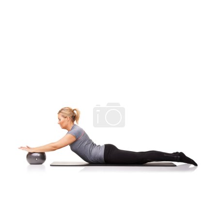 Photo for Stretching arms, pilates or woman on ball in workout, exercise or body health isolated on a white studio background mockup space. Flexible, mat or person on equipment for balance, training or fitness. - Royalty Free Image