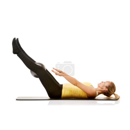 Photo for Woman exercise on soft ball, training body health and crunches isolated on a white studio background mockup space. Medicine equipment, core abdomen muscle and person in pilates, fitness and sit up. - Royalty Free Image