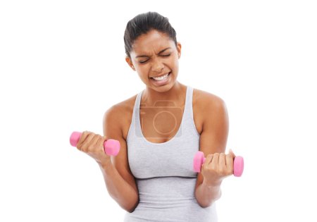 Photo for Woman, struggle and heavy dumbbell for fitness in studio with workout, training and wellness. Weights, female person and athlete with arm muscle and health with white background, exercise and sport. - Royalty Free Image