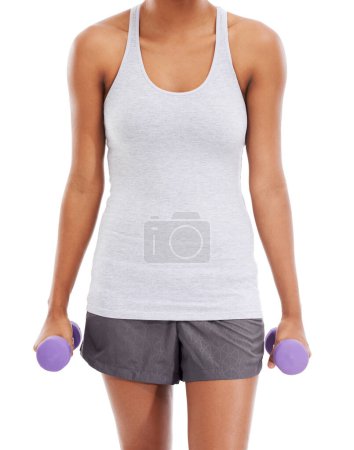 Photo for Woman, hands and dumbbells for weightlifting, exercise or workout against a white studio background. Closeup of female person with small weights for bodybuilding or muscle gain in fitness on mockup. - Royalty Free Image