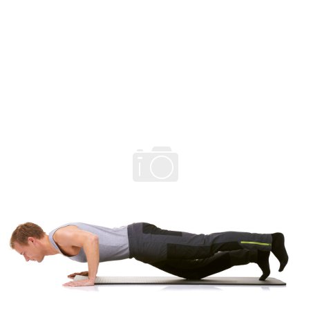 Photo for Man, workout or mat in studio for stretching, fitness or exercise for healthy body, wellness or core muscle. Person, balance or training on floor or abdomen health on mockup space or white background. - Royalty Free Image