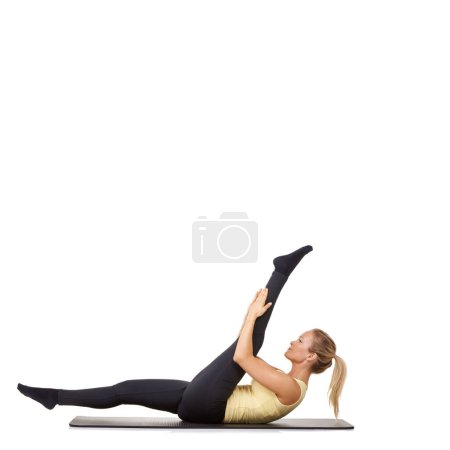 Photo for Woman, legs and stretching on yoga mat for gym flexibility, mockup space or white background. Female person, challenge and healthy wellness in studio for progress, splits practice or pilates training. - Royalty Free Image