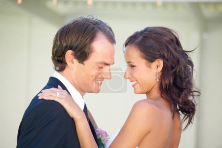 Photo for Wedding, couple and happy with hug, celebration and event for commitment, love and outdoor profile in summer. Man, woman and embrace with smile, romance and marriage with party, ring and jewelry. - Royalty Free Image