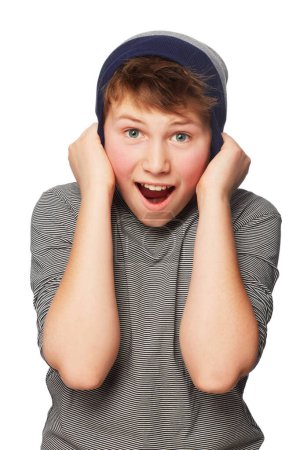 Photo for Shock, excited and portrait of child with beanie in a studio for positive, good and confident attitude. Happy, surprise and young boy teenager or kid with wow, omg or wtf face by white background - Royalty Free Image