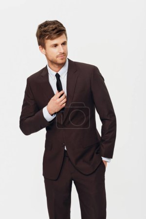 Photo for Fashion, style and a young business man in studio isolated on a white background for his corporate career. Work, job and a confident person in a trendy suit for formal employment or occupation. - Royalty Free Image