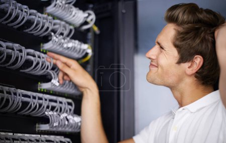 Photo for Server room, confused man and check cables with thinking for connectivity, night and hardware. Cybersecurity system, it network and technician for glitch, data center and problem solving for error. - Royalty Free Image