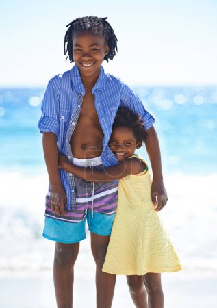 Photo for Children, siblings and portrait and beach for holiday vacation, outdoor relax or family bonding. Black people, girl and boy or face at ocean sand for happy kids adventure, summer fun or water explore. - Royalty Free Image