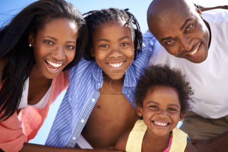 Photo for African family, parents or children and portrait at beach for adventure, holiday or vacation in summer. Black people, face or smile outdoor in nature for break, experience or bonding and relationship. - Royalty Free Image