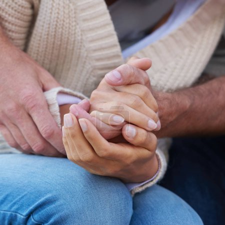 Photo for Couple, holding hands and closeup with love, care and support with empathy for illness, diagnosis or cancer. Solidarity, man and woman with gratitude, respect or comfort partner in crisis of health. - Royalty Free Image