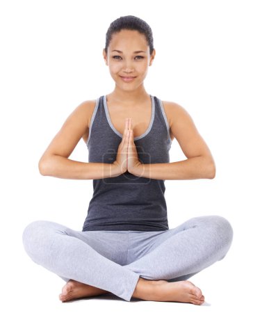 Photo for Woman, yoga and praying hands in studio fitness, meditation and holistic workout or mental health wellness. Portrait of a young person with calm, peace and zen exercise or faith on a white background. - Royalty Free Image