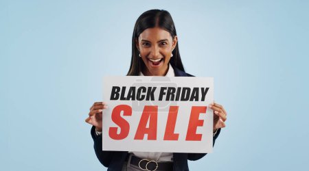 Photo for Happy woman, portrait and sale poster in discount, advertising or wow against a blue studio background. Excited female person and billboard in marketing, promotion or Black Friday special on mockup. - Royalty Free Image