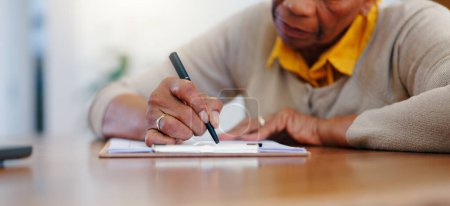 Photo for Senior woman, hands and writing agreement on contract, form or application for retirement plan or insurance at home. Closeup of elderly female person signing documents or paperwork on table at house. - Royalty Free Image
