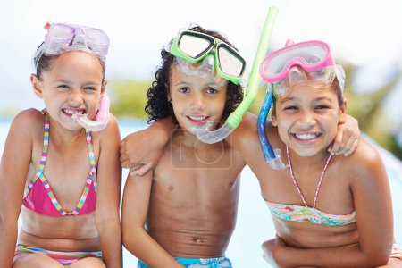 Photo for Pool, happy and portrait of children with goggles for swimming lesson, activity or hobby fun. Smile, snorkeling and kids with equipment for skill or tricks in water of outdoor backyard at home - Royalty Free Image