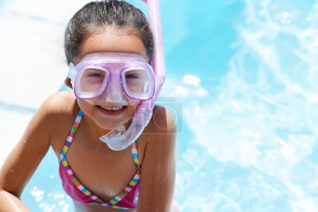 Photo for Pool, smile and portrait of child with goggles for swimming lesson, activity or hobby fun. Happy, snorkeling and girl kid with equipment for skill or tricks in water of outdoor backyard at home - Royalty Free Image