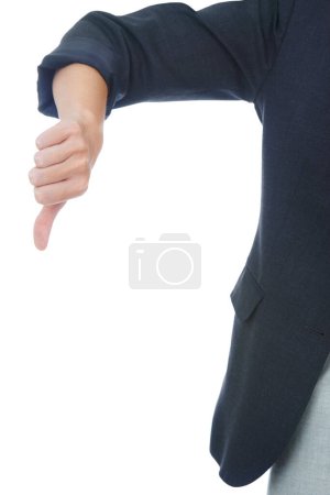 Photo for Businessperson, thumbs down and negative in studio, sign and dislike emoji by white background. Professional, employee and icon or symbol for review, vote and disagreement for corporate mistake. - Royalty Free Image