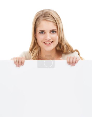 Photo for Happy, woman and portrait with blank poster, sign or banner in white background and mock up. Studio, space and person with an empty signage for announcement information, news on cardboard and paper. - Royalty Free Image