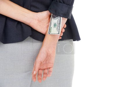 Photo for Cash, hidden or hands of manager in studio for illegal payment, corruption or secret scam. Sleeve closeup, white background or businesswoman stealing dollars for bribery, fraud or money laundering. - Royalty Free Image