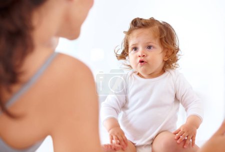 Photo for Bonding, mom and baby talking in home together with love, happiness and development of child, Kid, speaking and relax with mother in bedroom or morning with curious, learning and growth of toddler. - Royalty Free Image