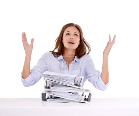 Photo for Stress, overworked and files with business woman in studio isolated on white background for frustration. Tax, why and burnout with young receptionist or secretary overwhelmed by pile of work on desk. - Royalty Free Image