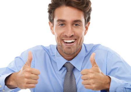 Photo for Thumbs up, portrait and excited business man in studio for winning deal, support icon or like agreement on white background. Winner, emoji sign or feedback of review, vote yes and thank you for trust. - Royalty Free Image