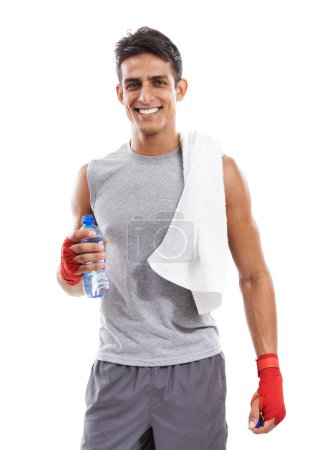 Photo for Man, martial arts and bottle in studio portrait for fitness, health and contact sport by white background. Person, athlete and smile on face with water, pride and exercise for mma, fight and conflict. - Royalty Free Image