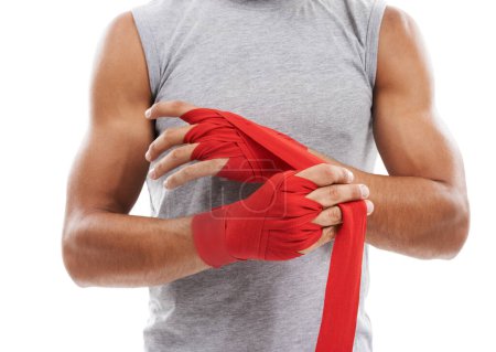 Photo for Wrapping hands, kickboxing and person ready for fitness in studio, sports and martial arts isolated on white background. Safety for fight, boxer and MMA fighter in training with exercise and power. - Royalty Free Image