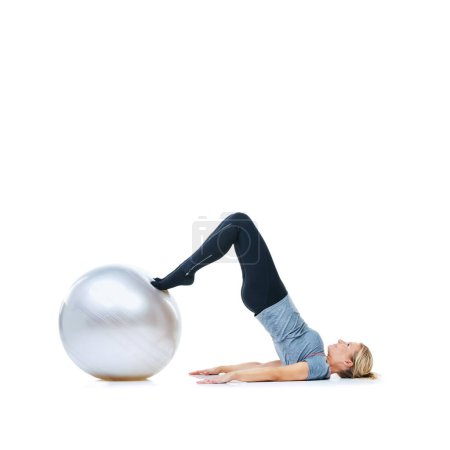 Photo for Woman, ball or stretching on a white background space for workout, wellness or mobility exercise. Female athlete training, core or fitness for mockup, stretching legs or body flexibility in studio. - Royalty Free Image