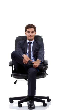 Photo for Businessman, portrait and manager sitting in a chair with white background or mock up space in studio. Serious, entrepreneur and waiting on seat with professional style, fashion or suit for work. - Royalty Free Image