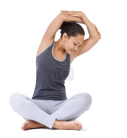 Photo for Woman, yoga and sitting in stretching exercise for health and wellness or workout against a white studio background. Calm female person or yogi in relax, body warm up or stretch for pilates on mockup. - Royalty Free Image