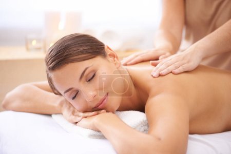 Photo for Happy woman, spa and massage on back for beauty, skincare and healing muscle at cosmetics salon. Masseuse, client and relax at wellness resort for acupressure, holistic therapy and shoulder treatment. - Royalty Free Image