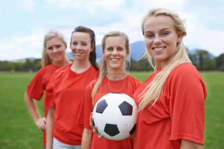 Photo for Woman, soccer players and portrait with ball, happy and football field for match, competition or game. Fitness, practice and ready for training, outdoor and exercise for athlete, confident or sport. - Royalty Free Image
