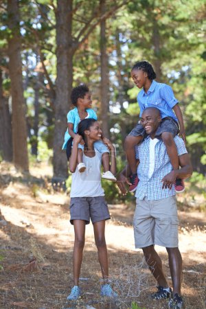 Photo for Happy, travel or black family hiking in forest to relax or bond on holiday vacation together in nature. Children siblings, mother or African father in woods trekking on outdoor adventure with smile. - Royalty Free Image
