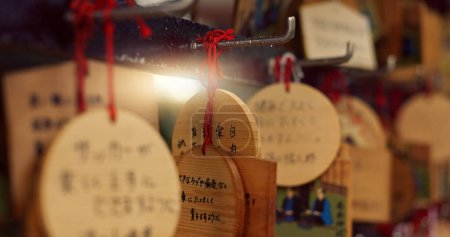 Photo for Shop, product and Japanese merchandise for sale, tourism or retail choice of souvenirs. Store, market or creative display of design for shopping, culture or traditional engraving on the shelf. - Royalty Free Image