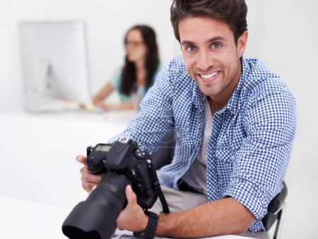 Photo for Man, photographer and portrait with camera, happy and lens for work, shoot and editing photographs. Professional, office and technology with creativity, internet and equipment for videography. - Royalty Free Image