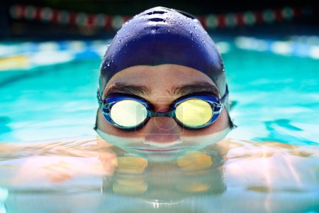 Photo for Swimming pool, goggles and sports man face for fitness exercise, outdoor workout or practice for race. Swimwear, wellness and wet swimmer doing waterpolo stroke, active cardio or training. - Royalty Free Image