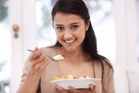 Photo for Happy woman, portrait and bowl of fruit salad for vitamin C, nutrition or healthy snack at home. Face of young female person, nutritionist or vegan smile for eating breakfast, diet or meal at house. - Royalty Free Image