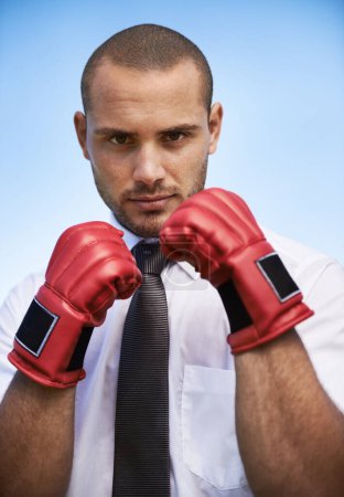 Photo for Business man, portrait and boxing gloves for power or warrior, self defence and fitness in studio. Male person, strong and equipment for fight or corporate challenge, exercise and sky background. - Royalty Free Image