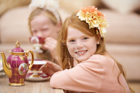 Photo for Girl, child and portrait with happiness at tea party in backyard for birthday, celebration and playing outdoor in home. Person, kid and face in garden of house with dress up, flower and role play fun. - Royalty Free Image