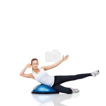Photo for Woman, athlete and fitness with bosu ball for core training and muscle, balance and workout on white background. Exercise equipment, strength and endurance with mockup space and strong in studio. - Royalty Free Image