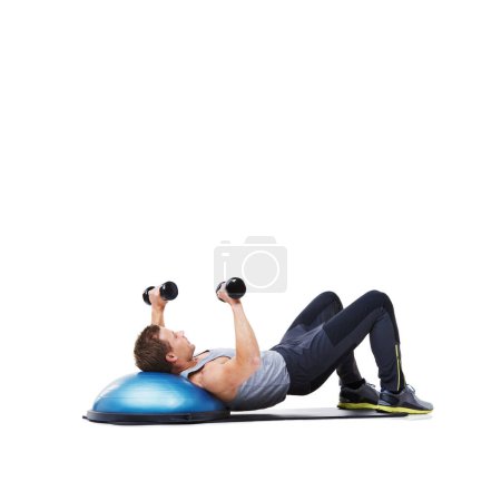 Photo for Man, lying and bosu ball with dumbbells for workout, exercise or weightlifting on a white studio background. Active young male person with weights in core training, gym or fitness on mockup space. - Royalty Free Image