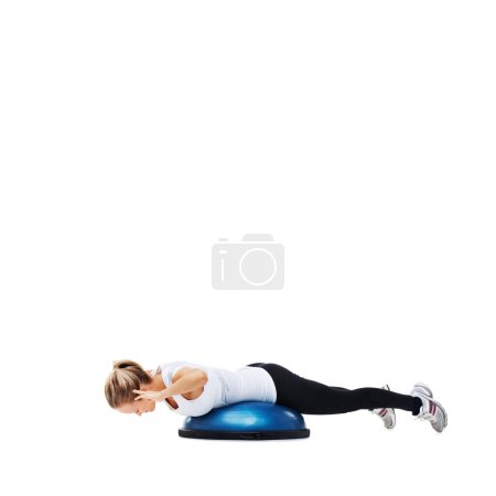 Photo for Woman, balance ball and lying for exercise, workout or fitness on a white studio background. Young active female person or athlete on half round object for training and wellness on mockup space. - Royalty Free Image