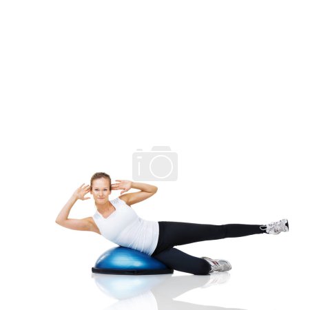Photo for Portrait of athlete, ball or core exercise in workout for abs or core development on white background. Woman, training equipment or fitness for studio mockup space, balance challenge or wellness. - Royalty Free Image