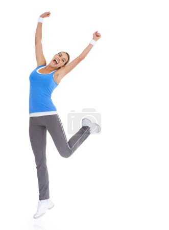Photo for Woman, fitness celebration and yes in studio for exercise, workout achievement and body goals or dance. Sports model with fist, energy or surprise portrait for training results on a white background. - Royalty Free Image