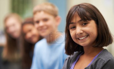 Photo for Girl, portrait and happy in corridor at school with confidence and pride for learning, education or knowledge. Student, person or face with smile in building or hallway before class or ready to study. - Royalty Free Image