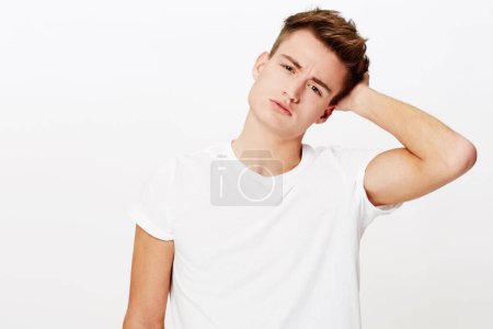 Confused, thinking and portrait of man scratching head in studio with why, asking or unsure on white background. Doubt, face and male model with questions, puzzled or gesture for guess, huh or memory.