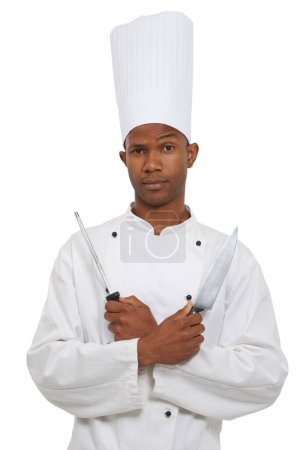 Photo for Black man, chef and portrait with knife sharpener in studio isolated on a white background. Face, cooking professional or blade, metal steel tool or utensil for serious catering service in restaurant. - Royalty Free Image