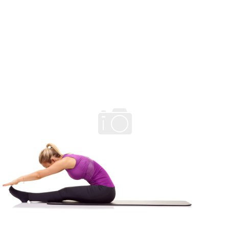 Photo for Woman, stretching or fitness on mat in studio for exercise, workout or healthy body with mock up space. Person, training or wellness for abdomen muscle or core strength and yoga with white background. - Royalty Free Image